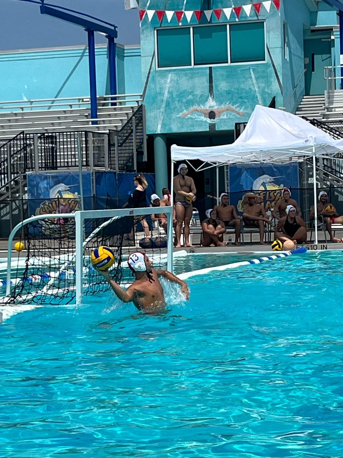Sailfish Splash tournament bench and team warmups